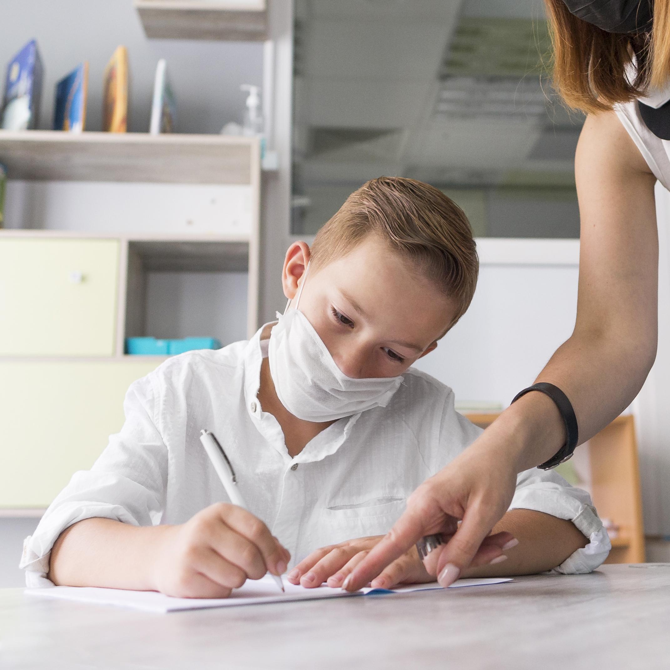 boy-wearing-medical-mask-classroom